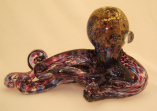 Long purple octopus with gold leaf
