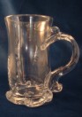 Tankard with figure as a handle